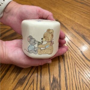 Vintage teddy bear and mouse piggy bank